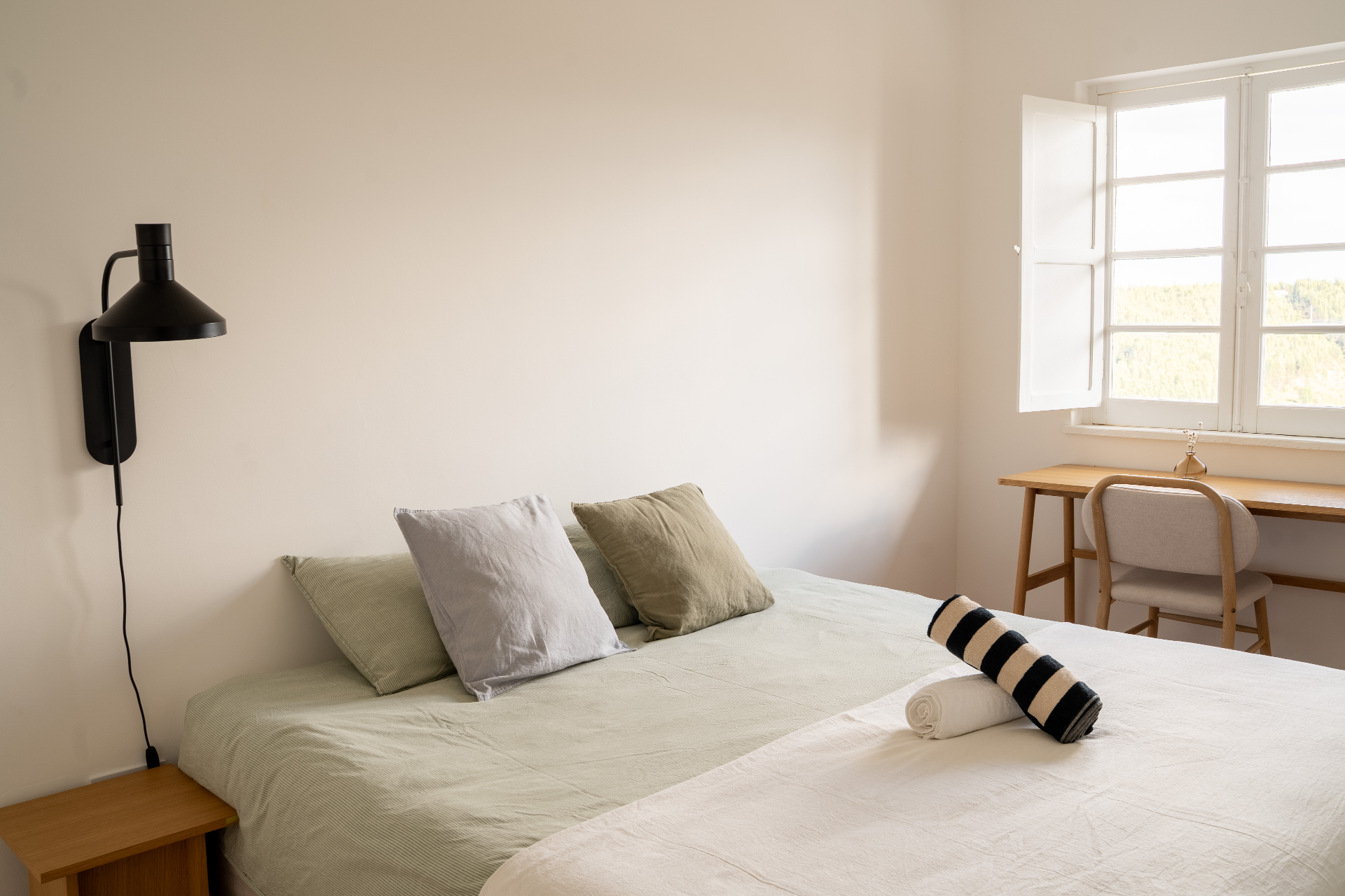A bedroom with valley view