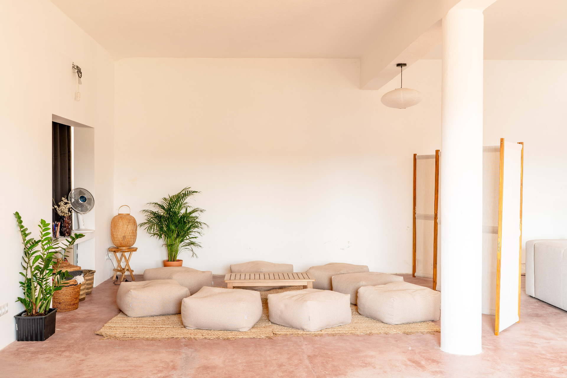 A quiet lounge area with floor cushions